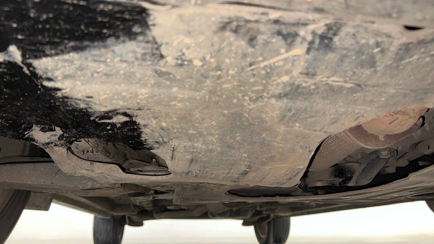 Used 2021 Mahindra XUV 300 W8 (O) 1.5 Diesel AMT Dual Tone Diesel Automatic extra FRONT LEFT UNDERBODY VIEW