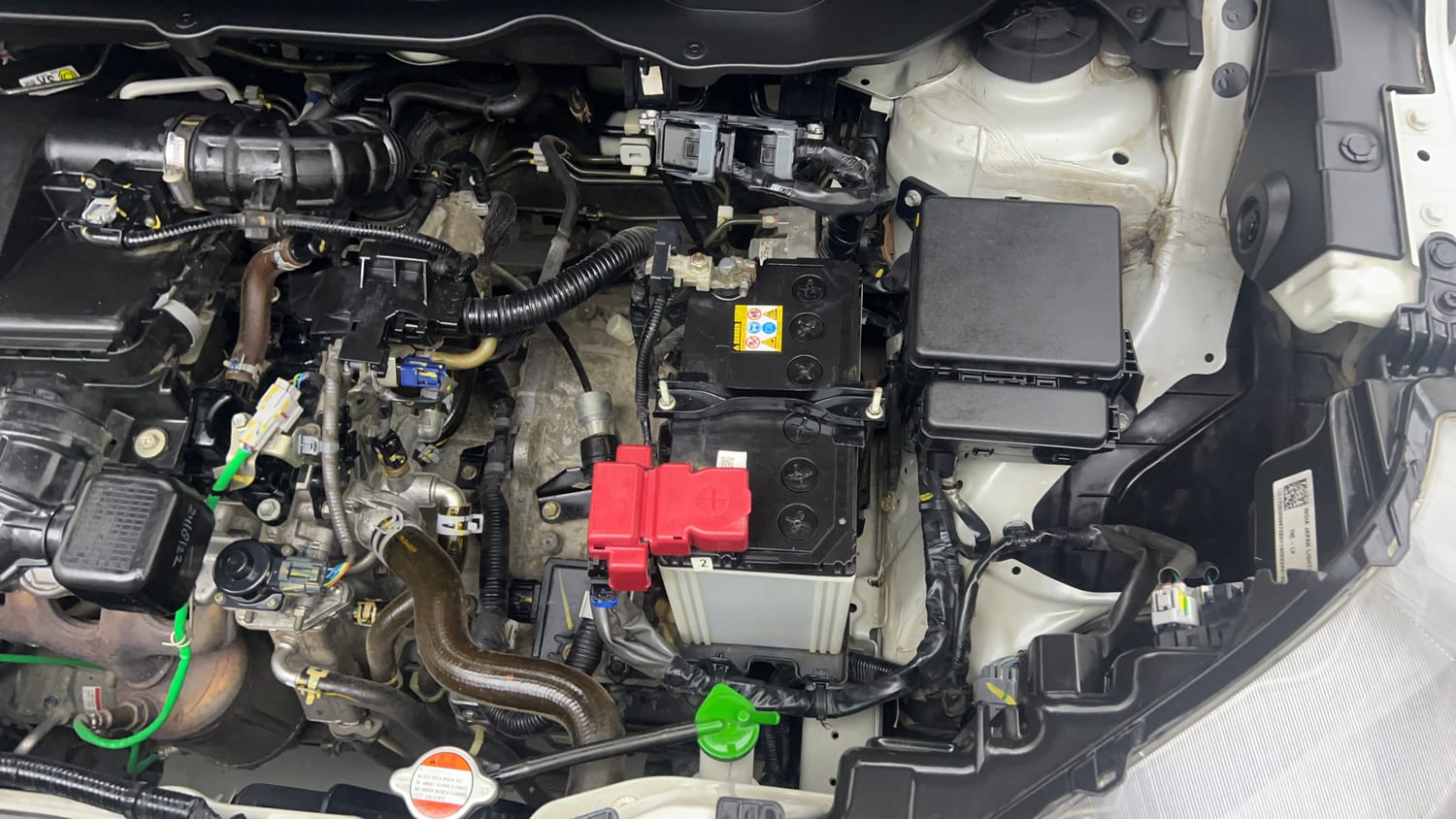Used 2022 Maruti Suzuki XL6 Alpha Plus AT Petrol Petrol Automatic engine ENGINE LEFT SIDE VIEW