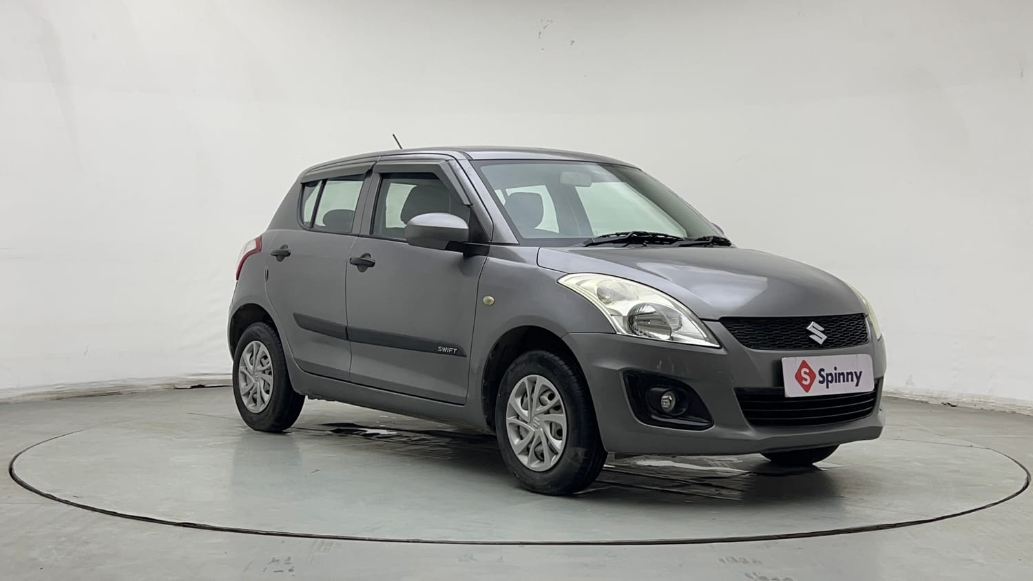 Used 2016 Maruti Suzuki Swift Lxi (O) Petrol Manual exterior RIGHT FRONT CORNER VIEW