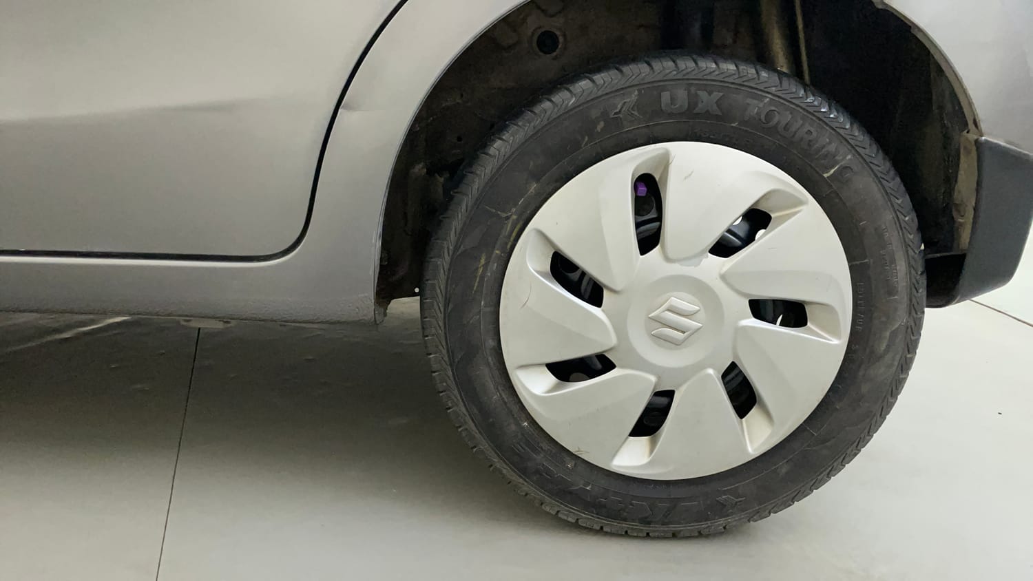 Used 2015 Maruti Suzuki Celerio ZXi Petrol Manual tyres LEFT REAR TYRE RIM VIEW