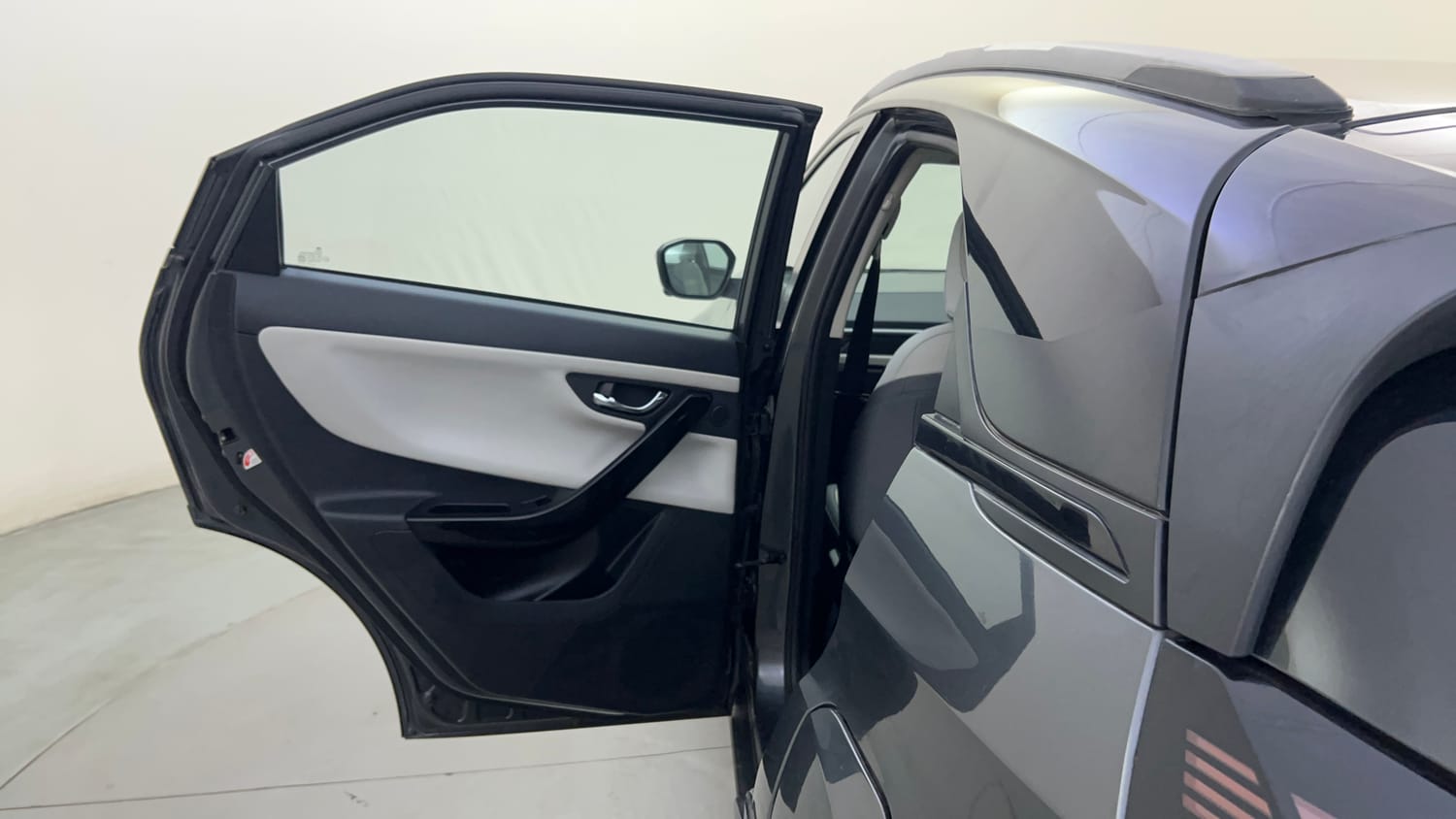 Used 2025 Tata Nexon EV Empowered 45 Electric Automatic interior LEFT REAR DOOR OPEN VIEW