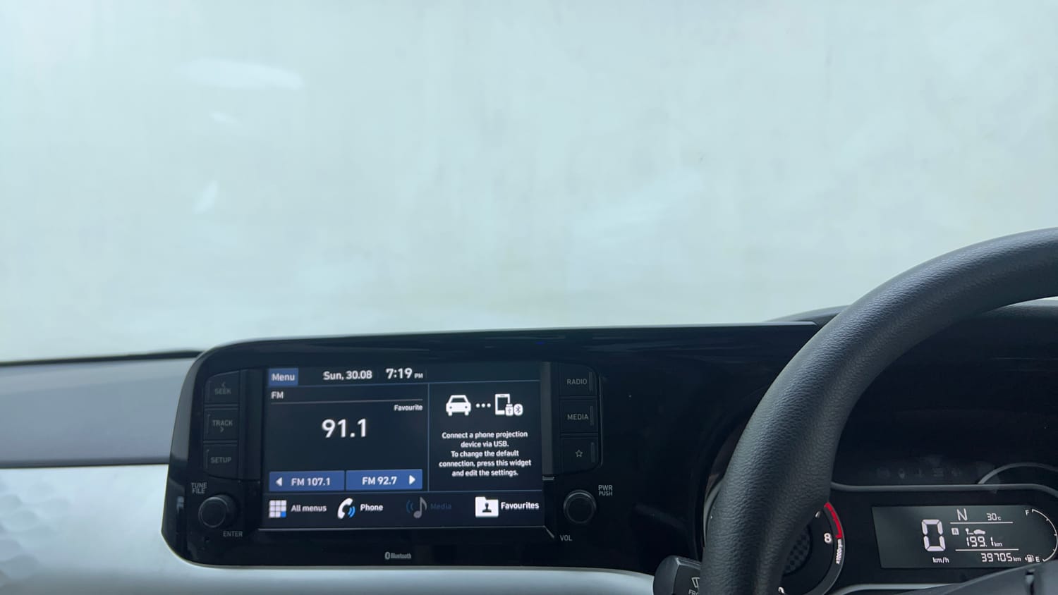 Used 2020 Hyundai Grand i10 Nios Sportz AMT 1.2 Kappa VTVT Petrol Automatic top_features Integrated (in-dash) music system