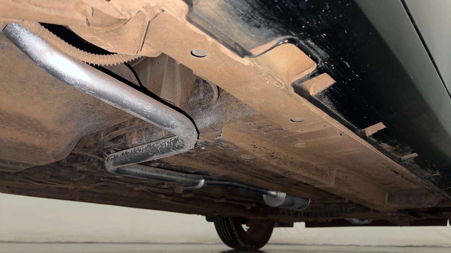 Used 2023 Tata Punch Kaziranga Creative iRA Pack AMT Petrol Automatic extra REAR RIGHT UNDERBODY VIEW
