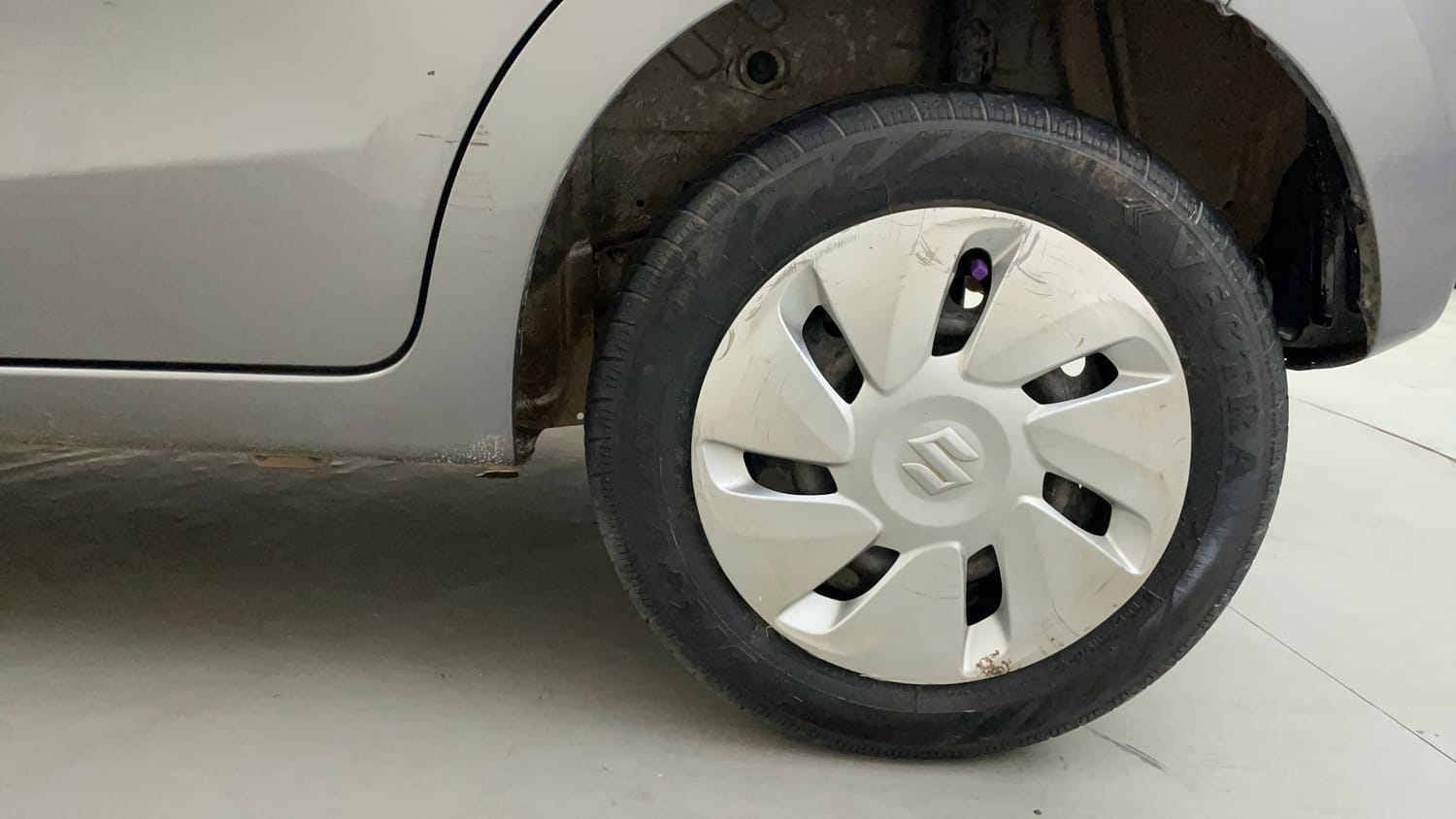 Used 2014 Maruti Suzuki Celerio VXi AMT Petrol Automatic tyres LEFT REAR TYRE RIM VIEW