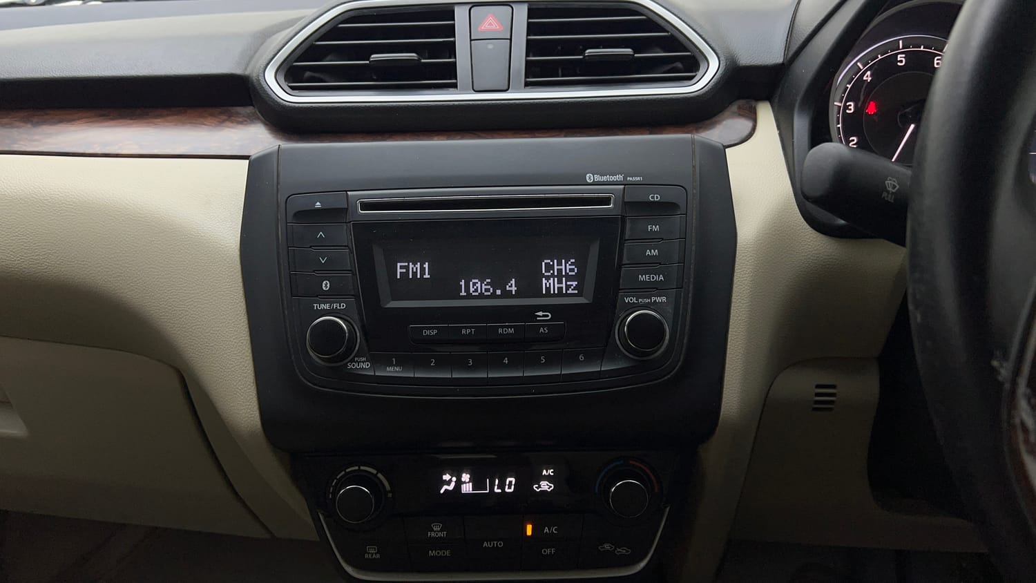 Used 2018 Maruti Suzuki Dzire ZXi AMT Petrol Automatic top_features Integrated (in-dash) music system