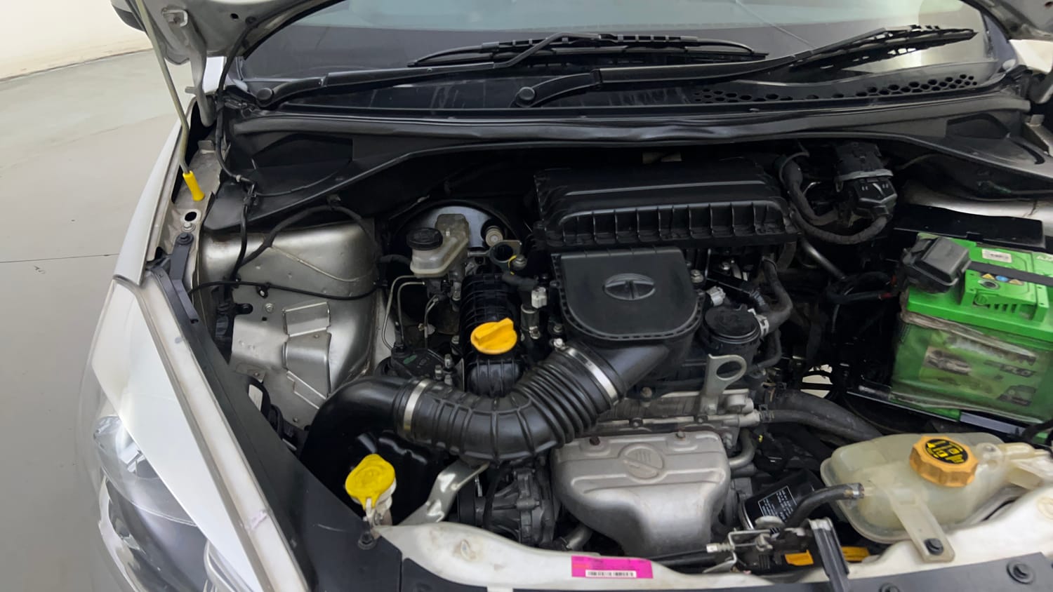 Used 2016 Tata Tiago Revotron XT Petrol Manual engine ENGINE RIGHT SIDE HINGE & APRON VIEW