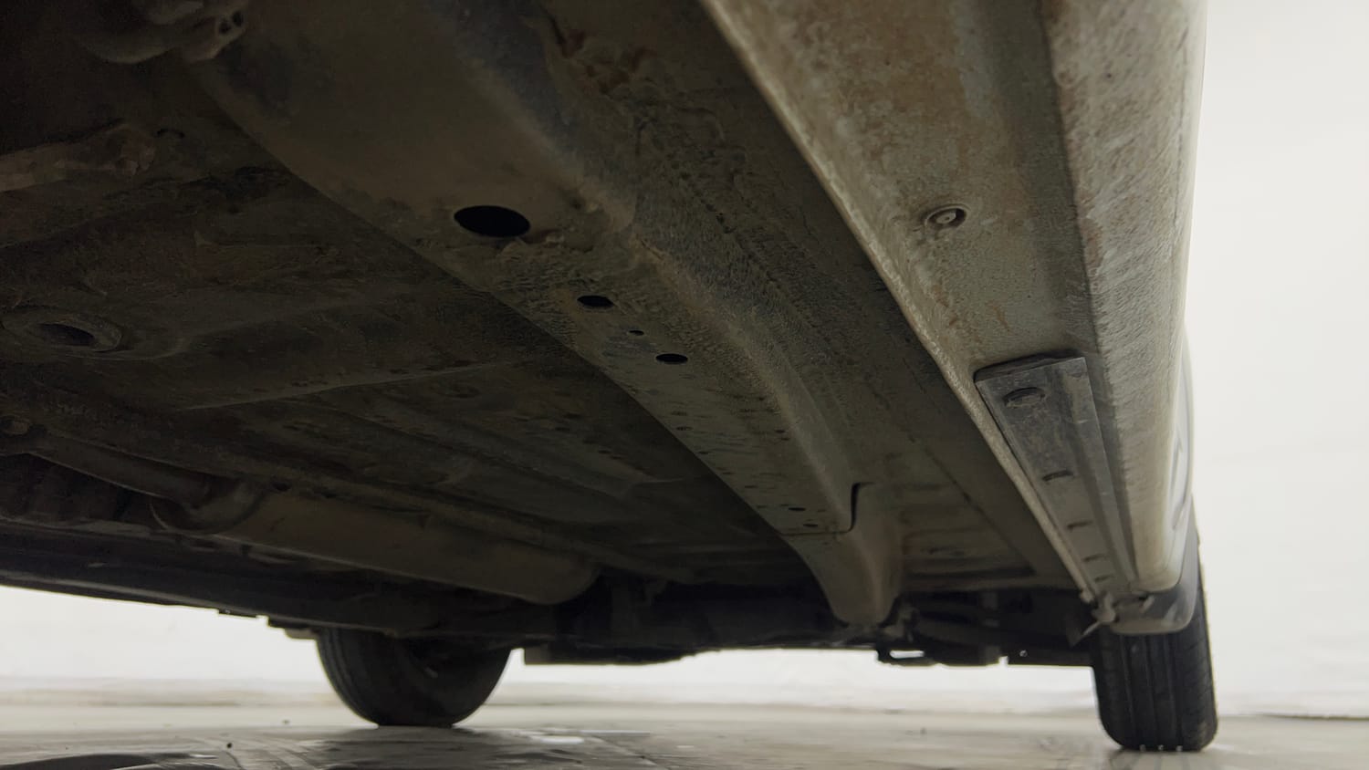 Used 2018 Maruti Suzuki Dzire VXi AMT Petrol Automatic extra REAR RIGHT UNDERBODY VIEW