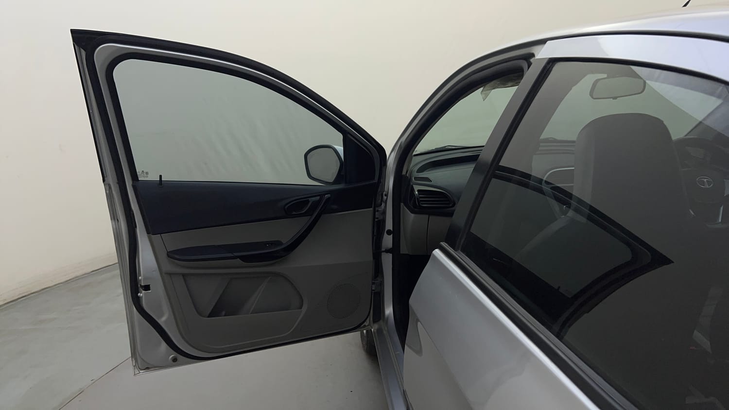 Used 2016 Tata Tiago Revotron XT Petrol Manual interior LEFT FRONT DOOR OPEN VIEW