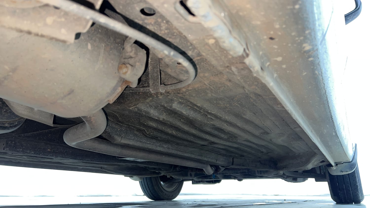 Used 2023 Honda Amaze VX CVT 1.2 Petrol Petrol Automatic extra REAR RIGHT UNDERBODY VIEW