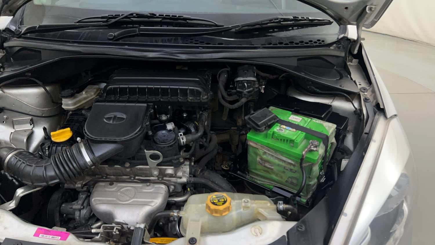 Used 2016 Tata Tiago Revotron XT Petrol Manual engine ENGINE LEFT SIDE HINGE & APRON VIEW
