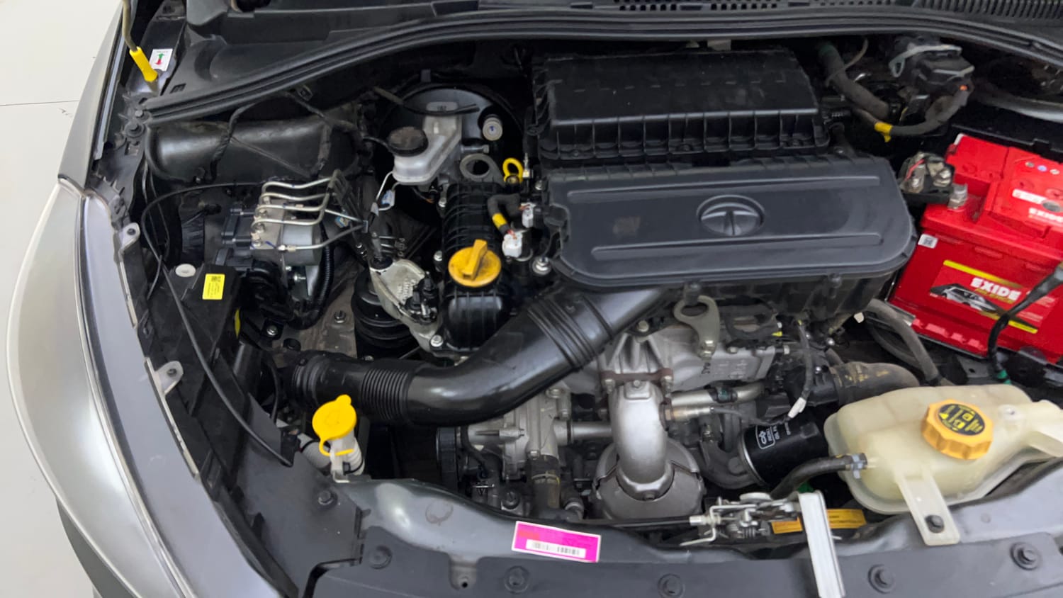 Used 2021 Tata Tiago XE Petrol Manual engine ENGINE RIGHT SIDE VIEW