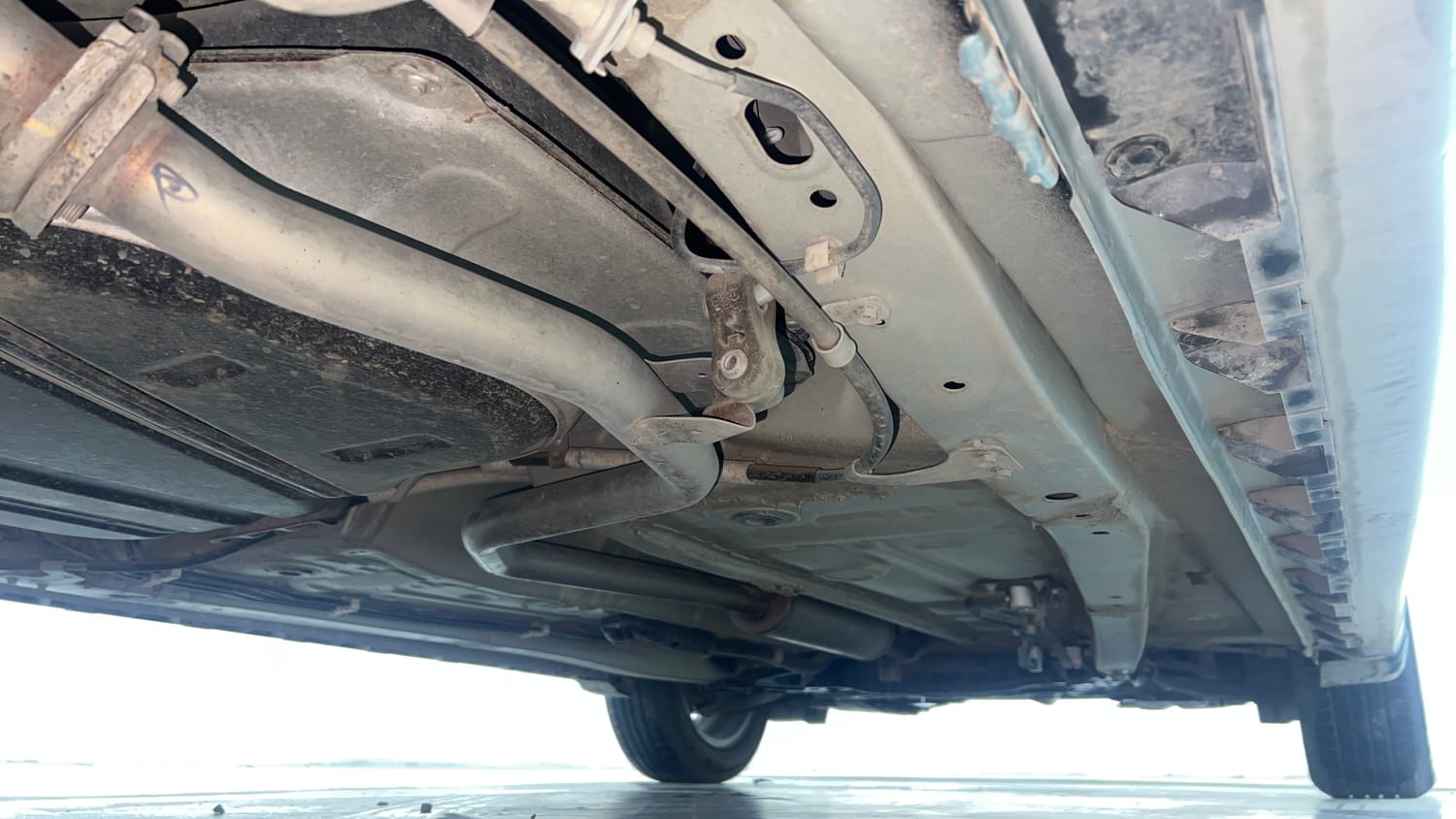 Used 2022 Maruti Suzuki XL6 Alpha Plus AT Petrol Petrol Automatic extra REAR RIGHT UNDERBODY VIEW