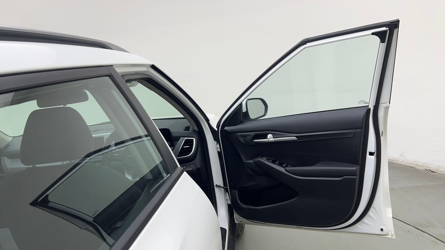 Used 2024 Kia Seltos HTK 1.5 Petrol MT Petrol Manual interior RIGHT FRONT DOOR OPEN VIEW