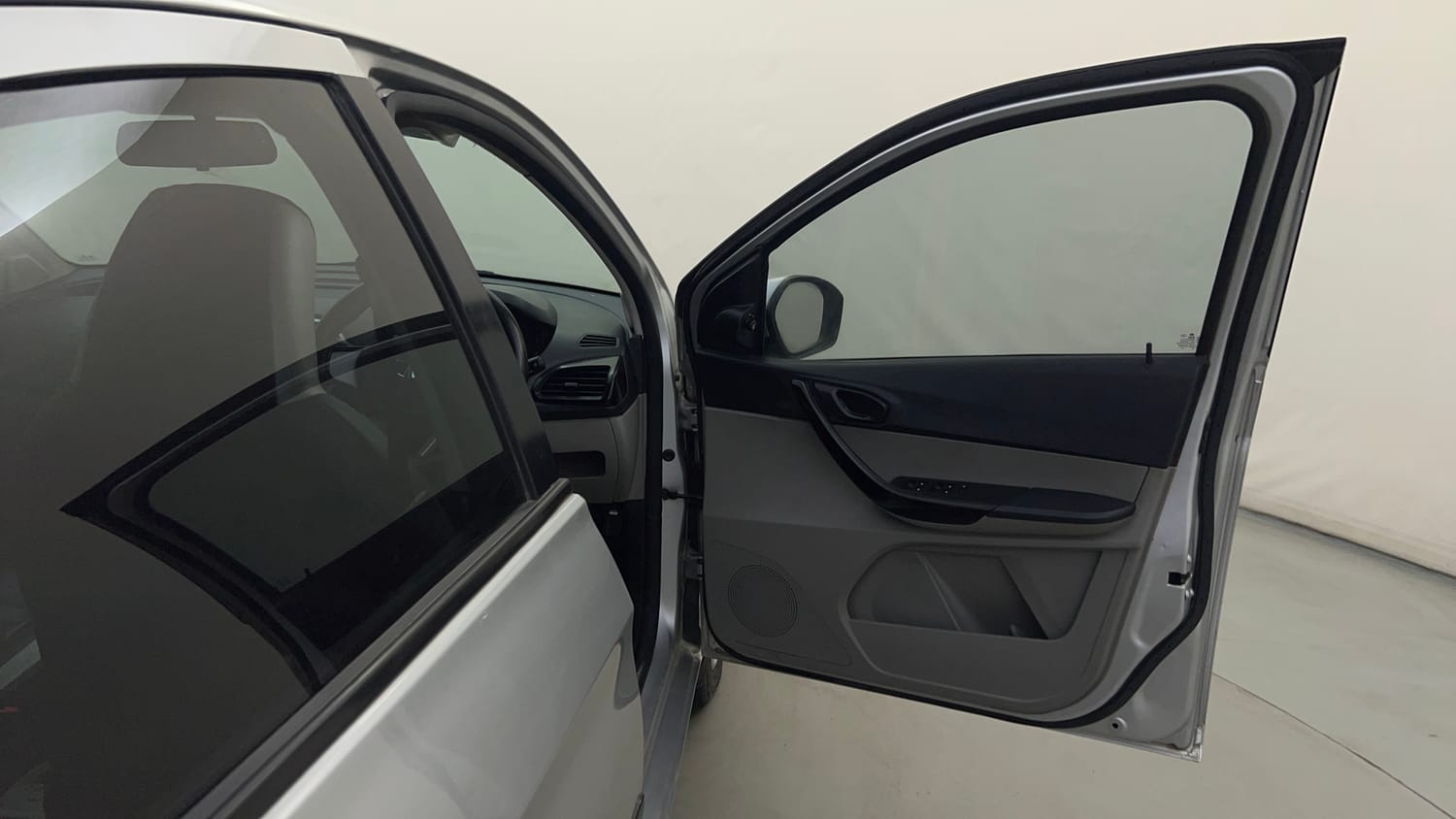 Used 2016 Tata Tiago Revotron XT Petrol Manual interior RIGHT FRONT DOOR OPEN VIEW