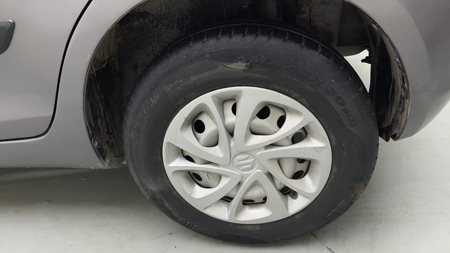 Used 2016 Maruti Suzuki Swift Lxi (O) Petrol Manual tyres LEFT REAR TYRE RIM VIEW