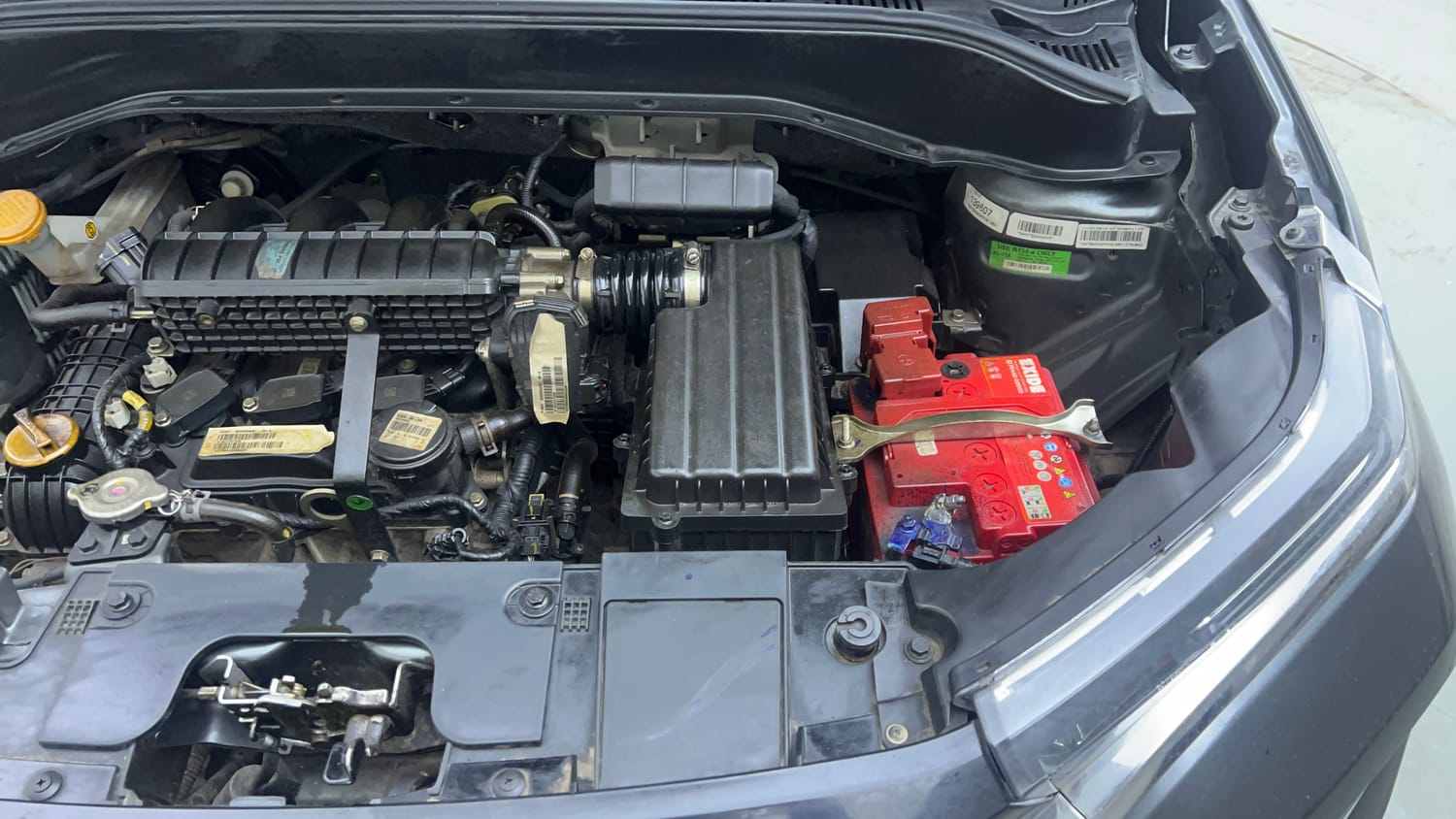 Used 2024 Tata Punch Creative Dual Tone AMT Petrol Automatic engine ENGINE LEFT SIDE VIEW