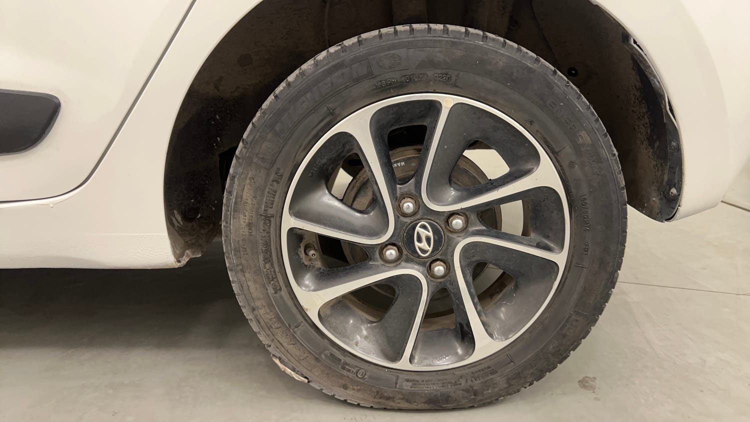 Used 2017 Hyundai Grand i10 Asta 1.2 Kappa VTVT Petrol Manual tyres LEFT REAR TYRE RIM VIEW