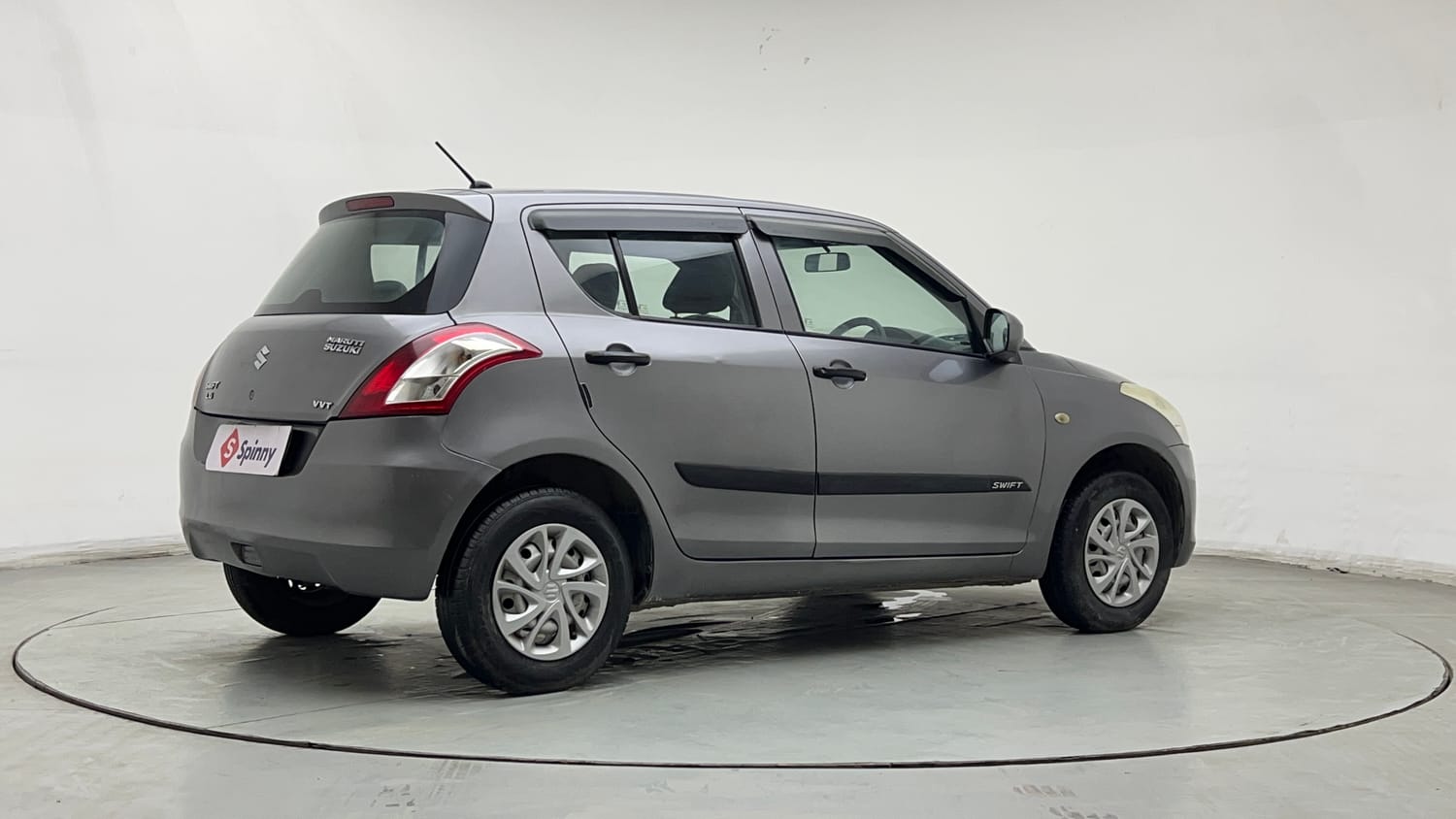 Used 2016 Maruti Suzuki Swift Lxi (O) Petrol Manual exterior RIGHT REAR CORNER VIEW