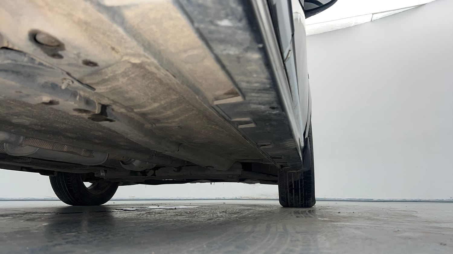 Used 2020 Hyundai New i20 Asta (O) 1.0 Turbo DCT Petrol Automatic extra REAR RIGHT UNDERBODY VIEW