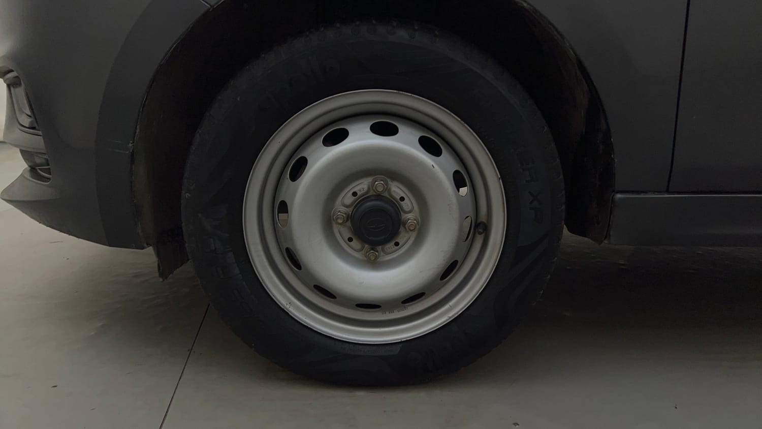 Used 2021 Tata Tiago XE Petrol Manual tyres LEFT FRONT TYRE RIM VIEW