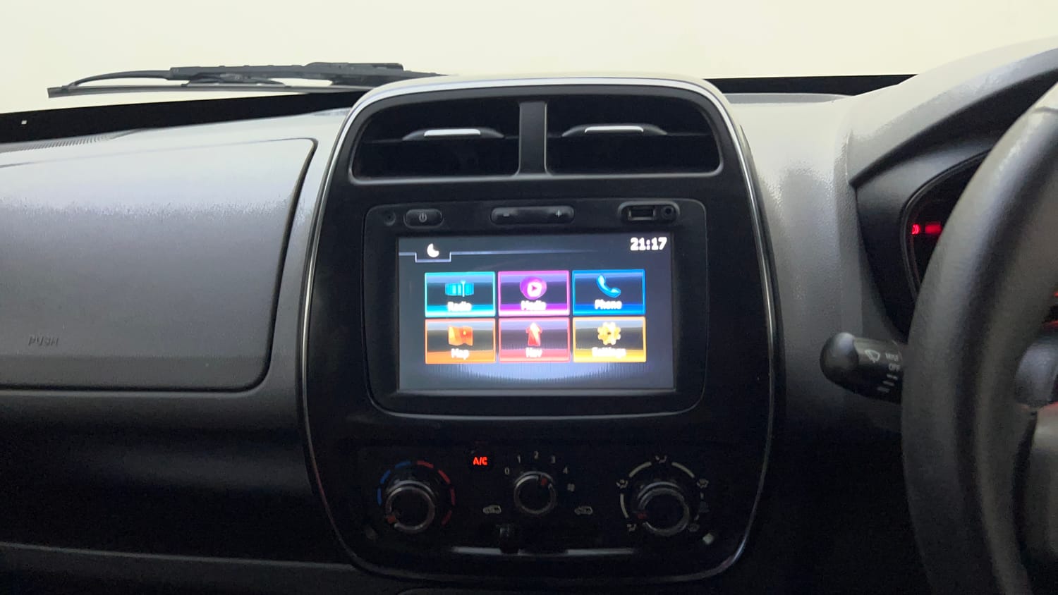 Used 2017 Renault Kwid RXT Petrol Manual top_features Integrated (in-dash) music system