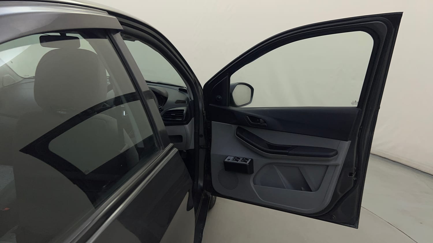 Used 2021 Tata Tiago XE Petrol Manual interior RIGHT FRONT DOOR OPEN VIEW