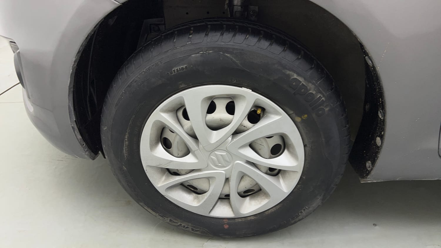 Used 2016 Maruti Suzuki Swift Lxi (O) Petrol Manual tyres LEFT FRONT TYRE RIM VIEW
