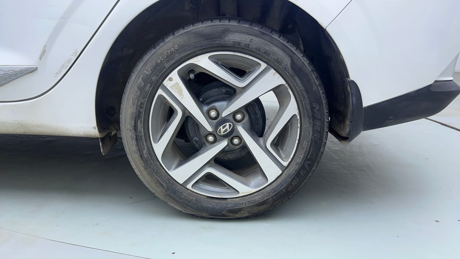 Used 2021 Hyundai Aura SX Plus 1.2 AMT Petrol Petrol Automatic tyres LEFT REAR TYRE RIM VIEW