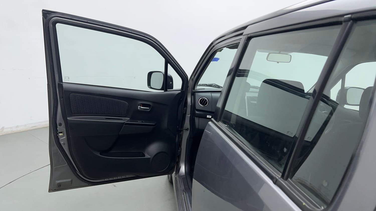 Used 2013 Maruti Suzuki Wagon R Stingray VXi Petrol Manual interior LEFT FRONT DOOR OPEN VIEW
