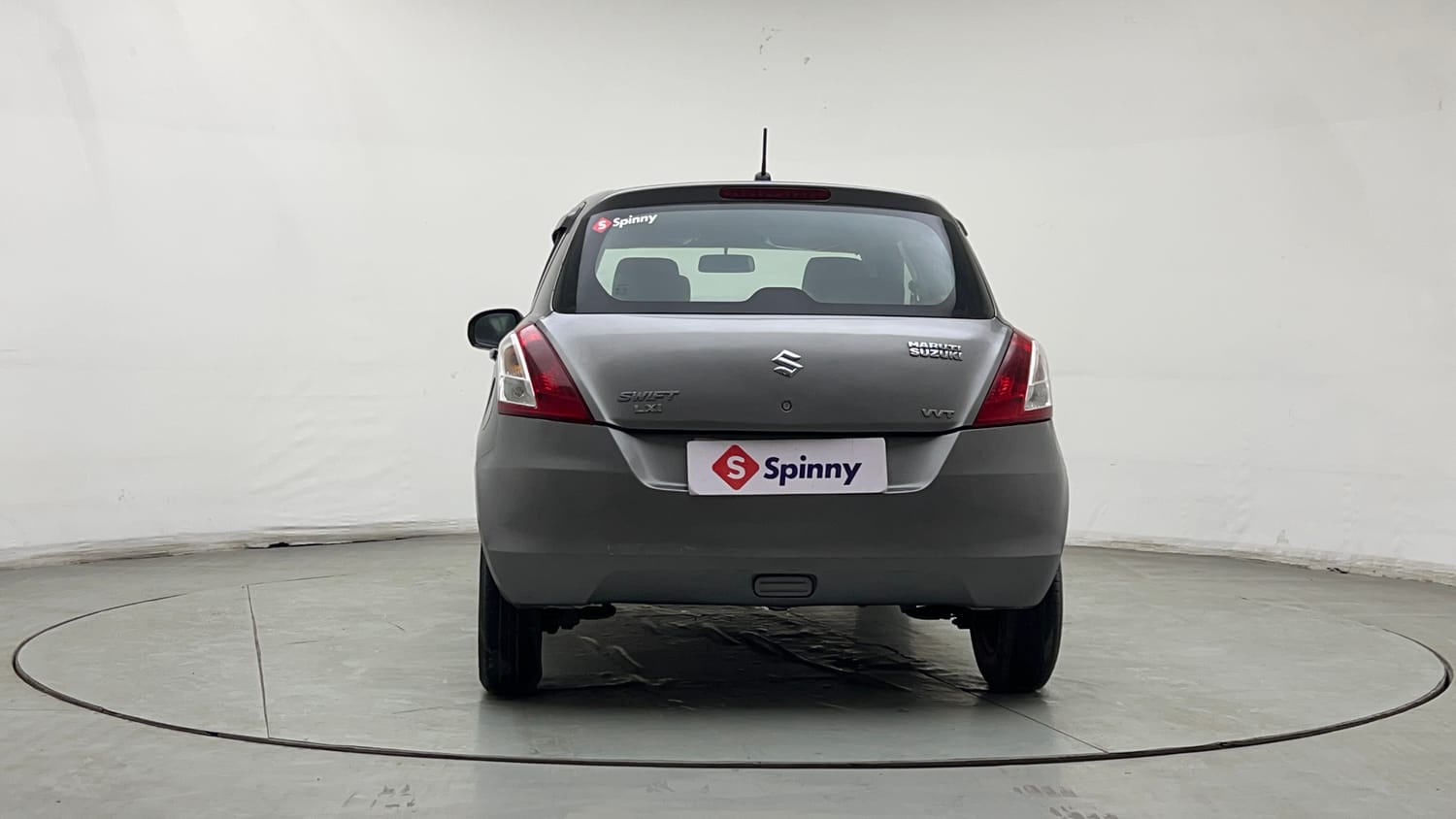 Used 2016 Maruti Suzuki Swift Lxi (O) Petrol Manual exterior BACK VIEW