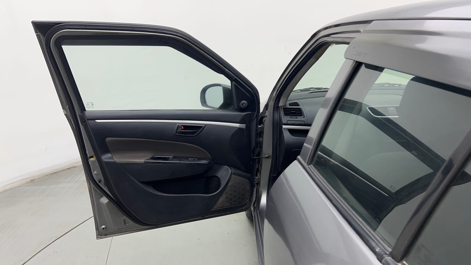 Used 2016 Maruti Suzuki Swift Lxi (O) Petrol Manual interior LEFT FRONT DOOR OPEN VIEW