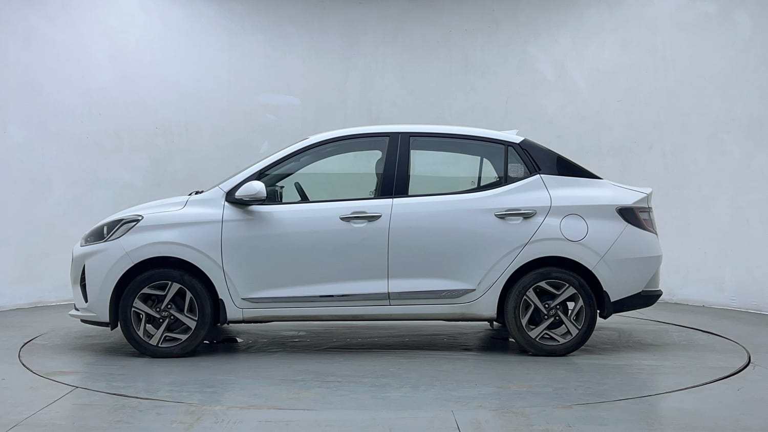 Used 2021 Hyundai Aura SX Plus 1.2 AMT Petrol Petrol Automatic exterior LEFT SIDE VIEW