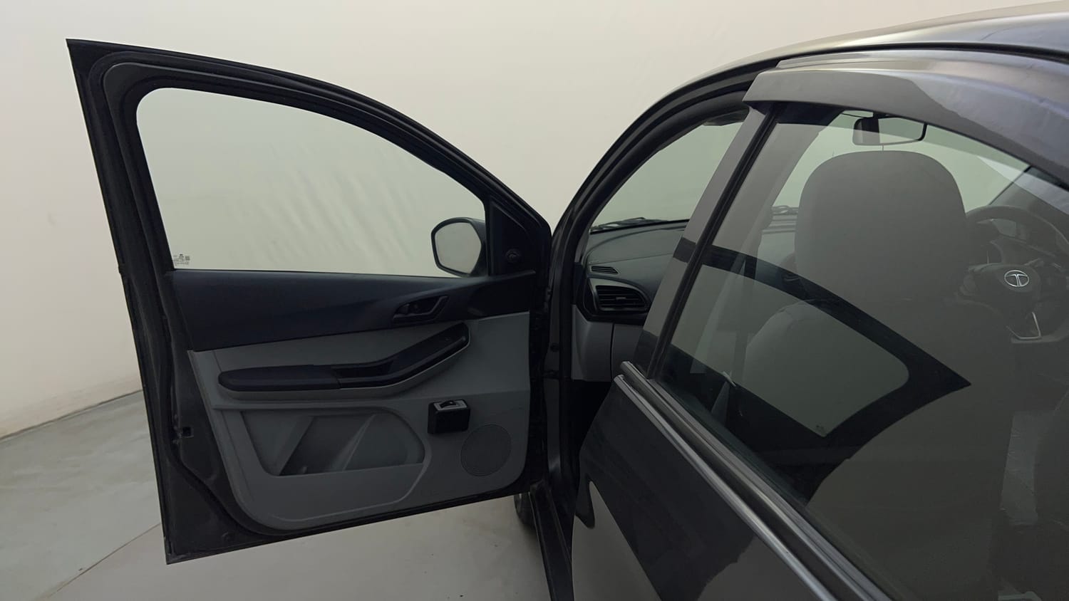 Used 2021 Tata Tiago XE Petrol Manual interior LEFT FRONT DOOR OPEN VIEW