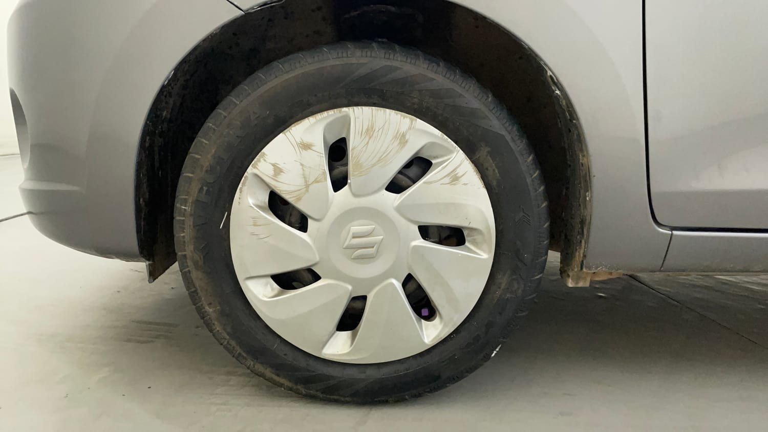 Used 2014 Maruti Suzuki Celerio VXi AMT Petrol Automatic tyres LEFT FRONT TYRE RIM VIEW
