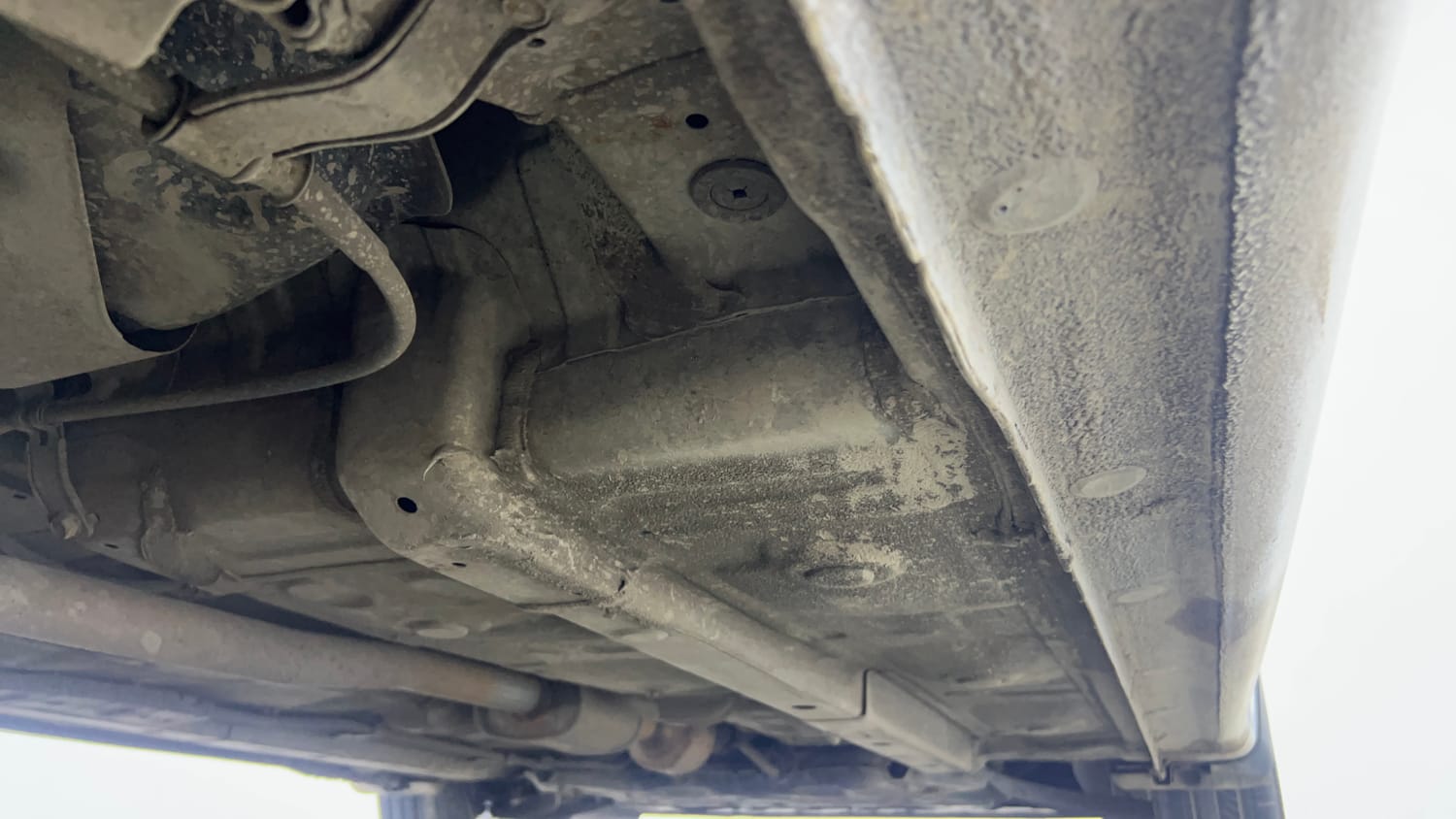 Used 2021 Hyundai Aura SX Plus 1.2 AMT Petrol Petrol Automatic extra REAR RIGHT UNDERBODY VIEW