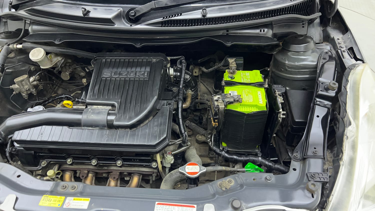 Used 2016 Maruti Suzuki Swift Lxi (O) Petrol Manual engine ENGINE LEFT SIDE VIEW
