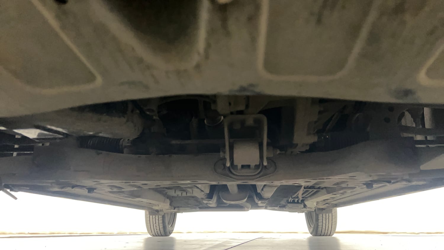 Used 2023 Hyundai New i20 Sportz 1.2 MT Petrol Manual extra FRONT LEFT UNDERBODY VIEW