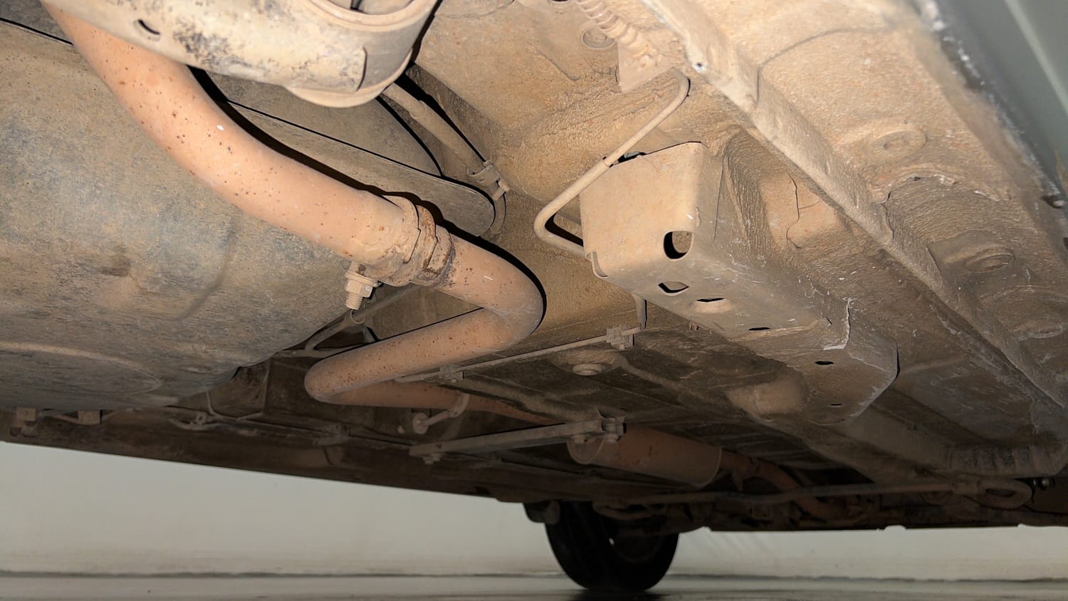 Used 2016 Tata Tiago Revotron XT Petrol Manual extra REAR RIGHT UNDERBODY VIEW