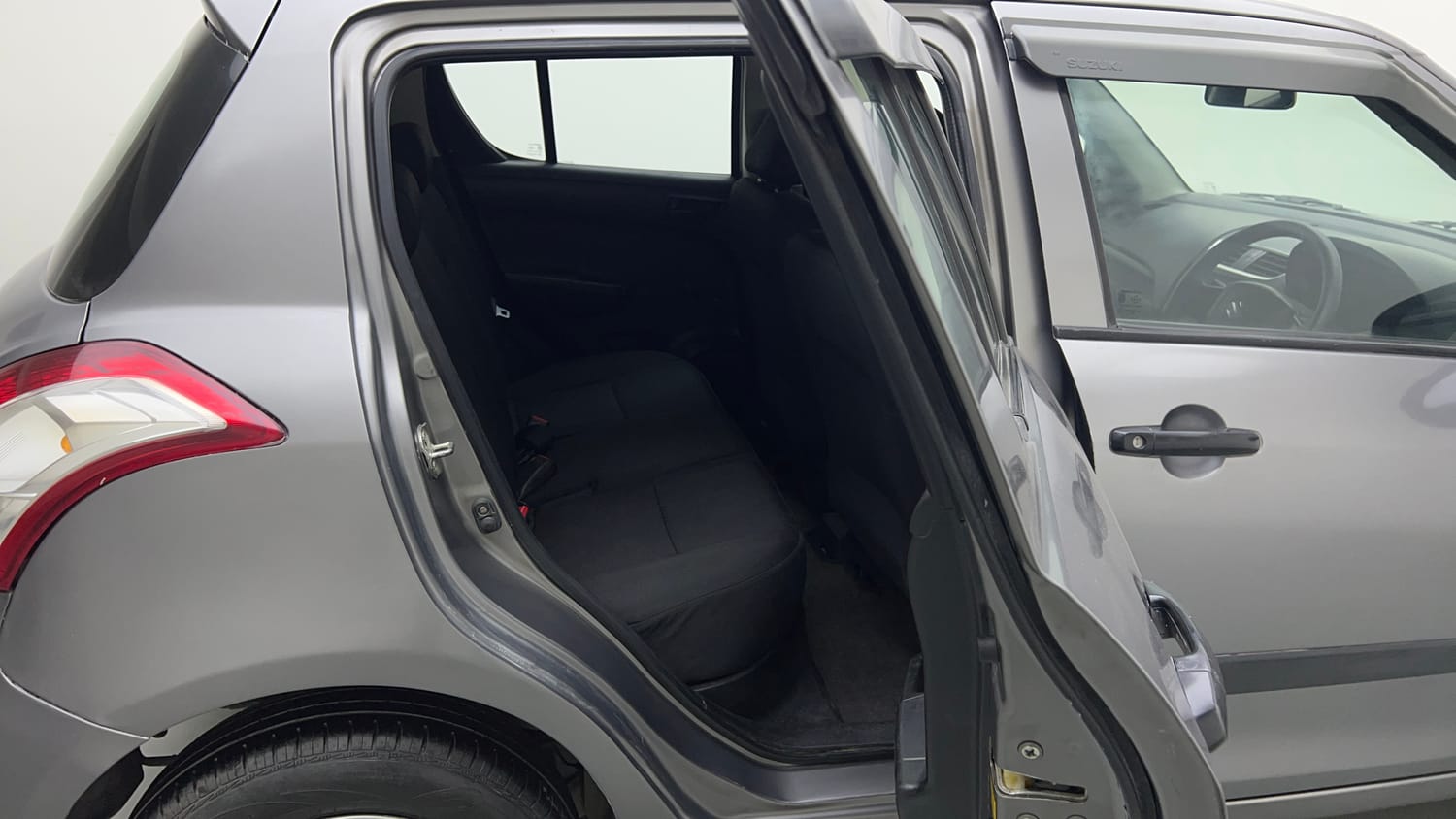 Used 2016 Maruti Suzuki Swift Lxi (O) Petrol Manual interior RIGHT SIDE REAR DOOR CABIN VIEW