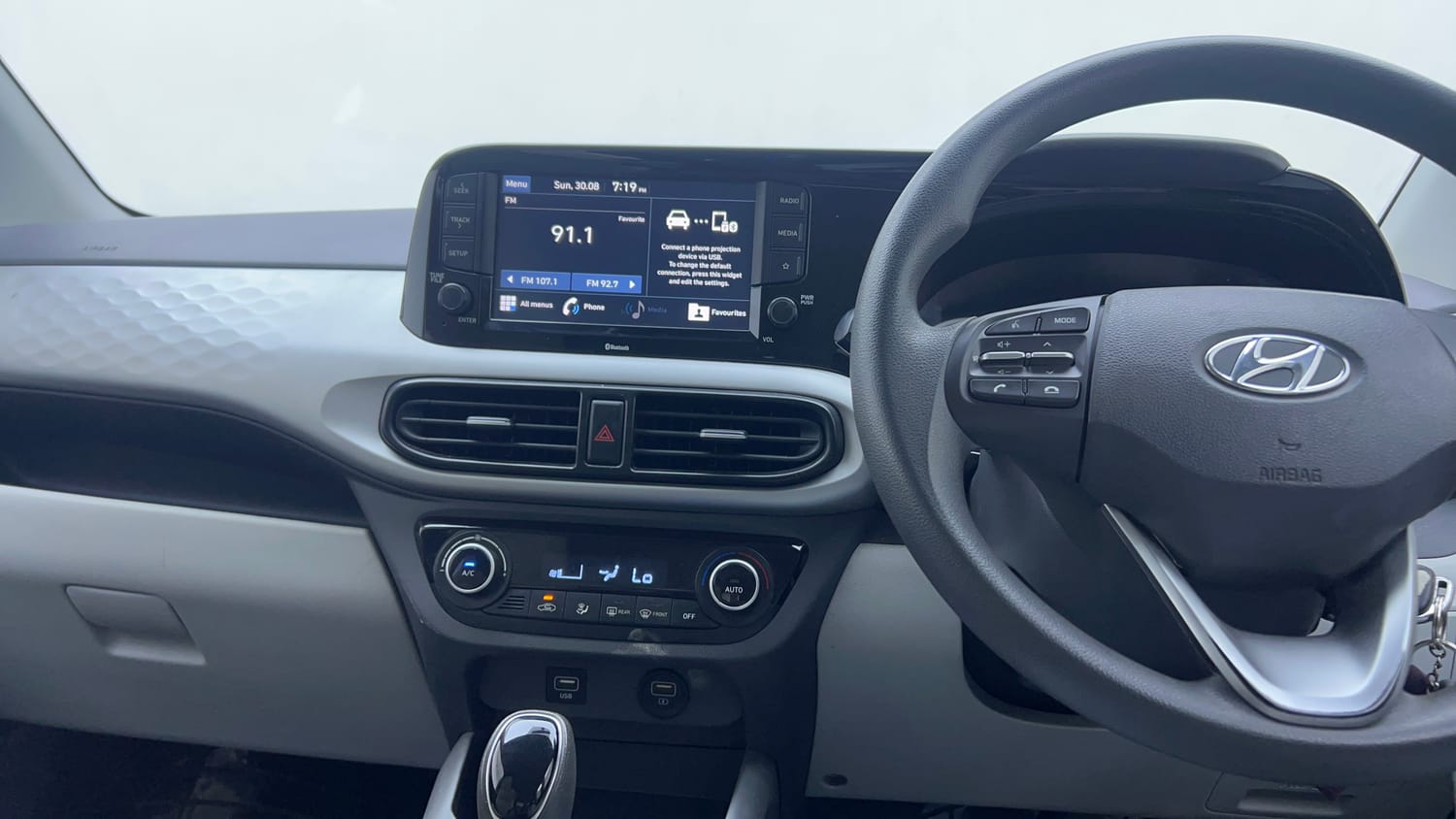 Used 2020 Hyundai Grand i10 Nios Sportz AMT 1.2 Kappa VTVT Petrol Automatic interior MUSIC SYSTEM & AC CONTROL VIEW