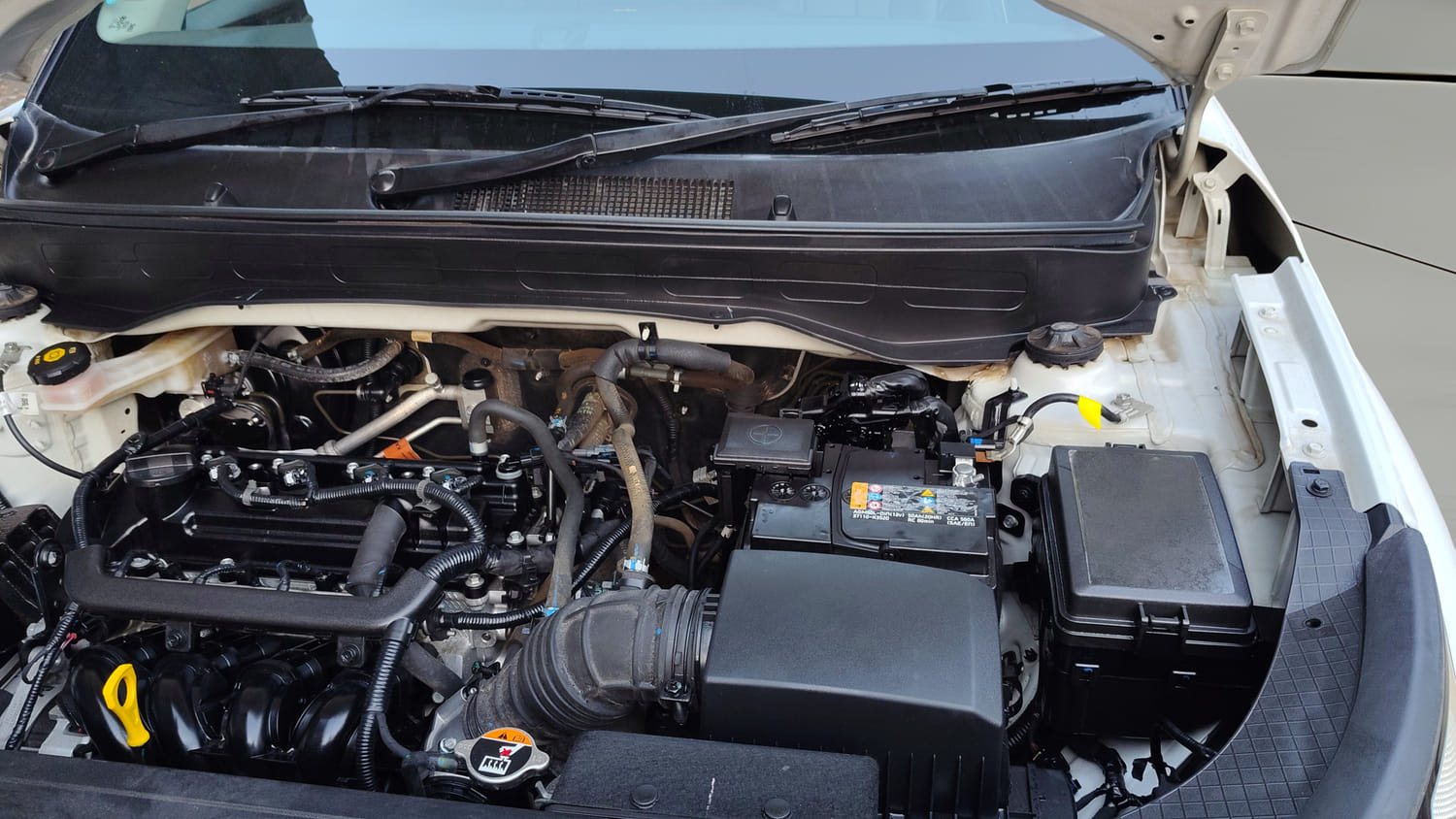 Used 2024 Hyundai Venue S (O) Plus 1.2 Petrol Adventure Edition Petrol Manual engine ENGINE LEFT SIDE HINGE & APRON VIEW