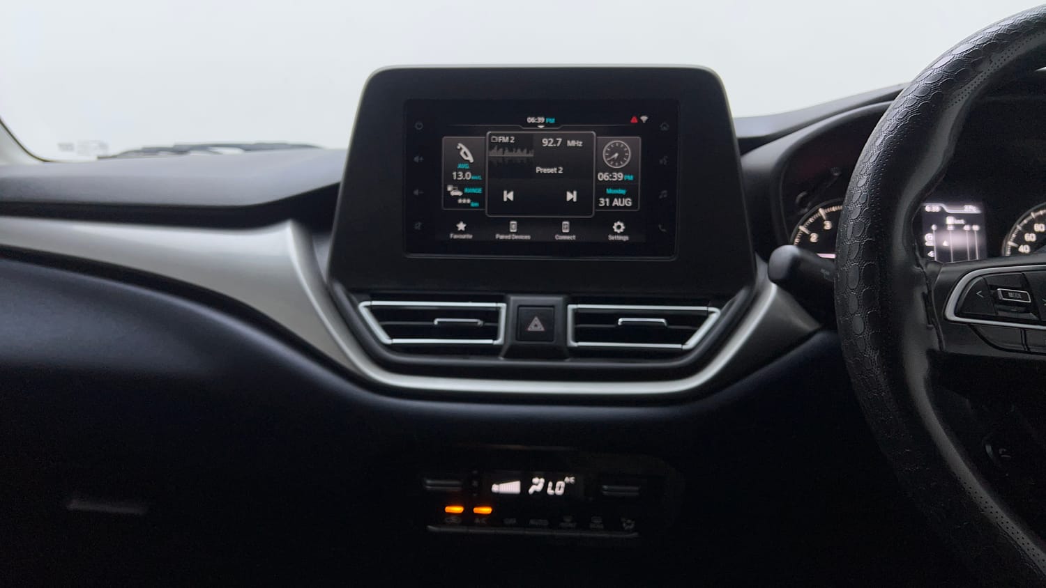 Used 2025 Maruti Suzuki Baleno Zeta MT Petrol Manual top_features Integrated (in-dash) music system