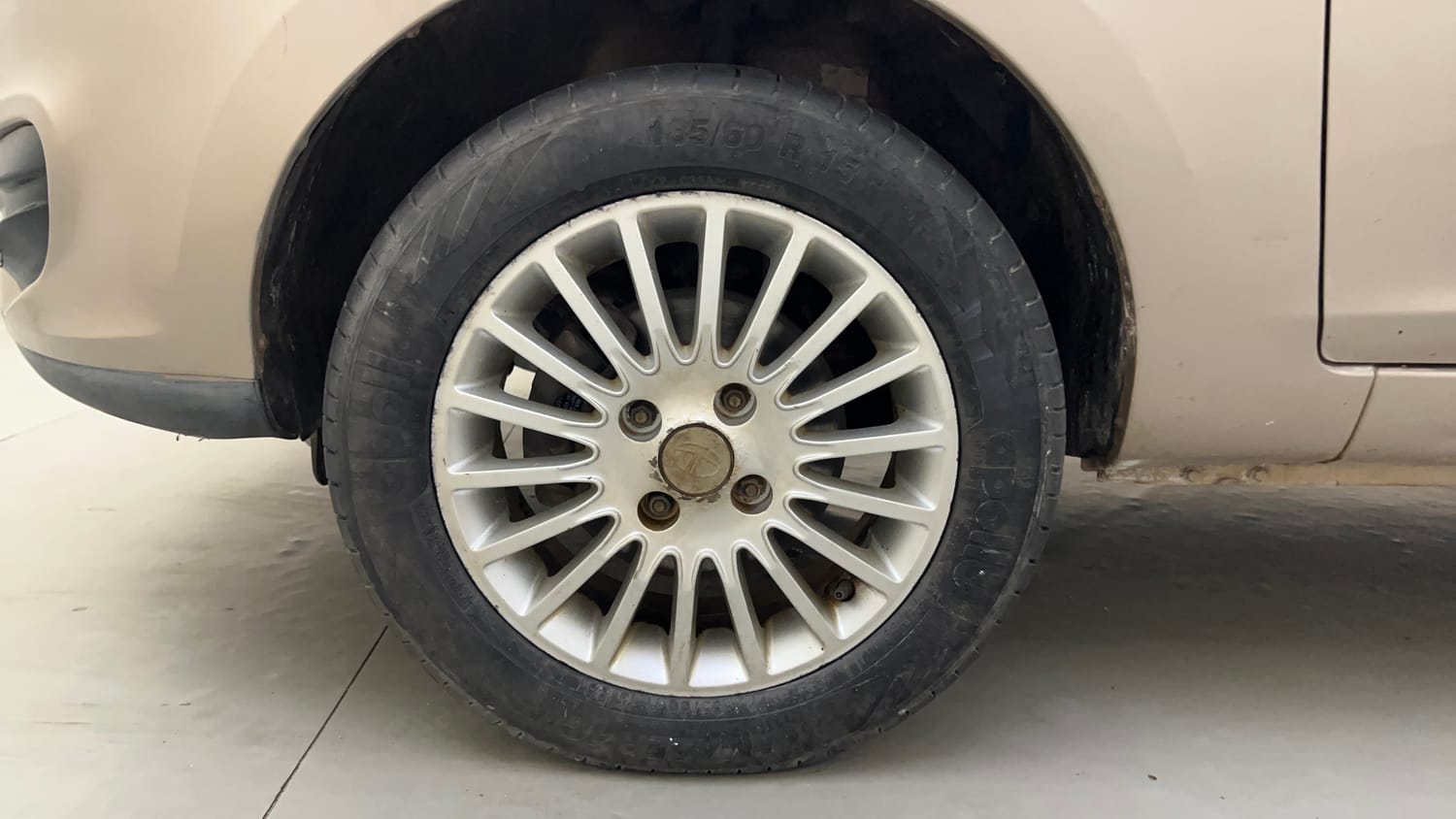 Used 2015 Tata Zest XE Petrol Petrol Manual tyres LEFT FRONT TYRE RIM VIEW