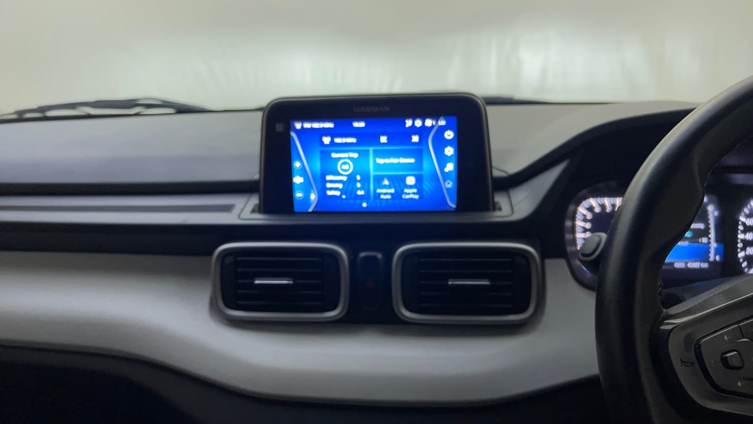 Used 2024 Tata Punch Creative Dual Tone AMT Petrol Automatic top_features Integrated (in-dash) music system