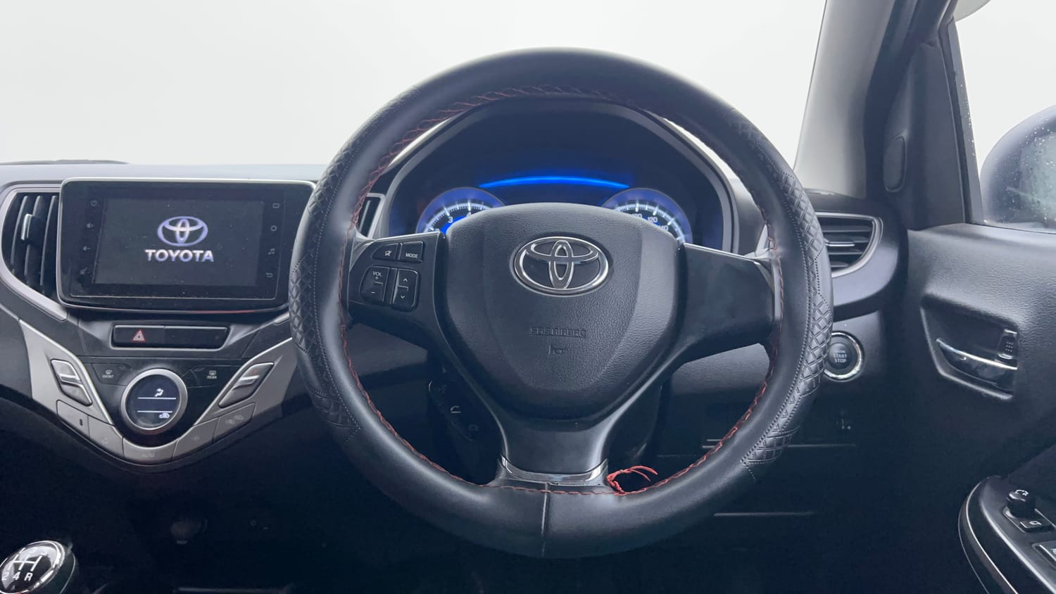 Used 2021 Toyota Glanza G Petrol Manual interior STEERING VIEW