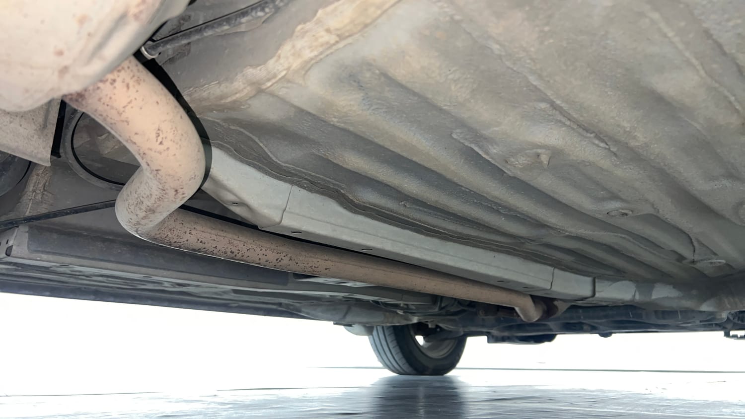 Used 2022 Honda Amaze VX CVT 1.2 Petrol Petrol Automatic extra REAR RIGHT UNDERBODY VIEW