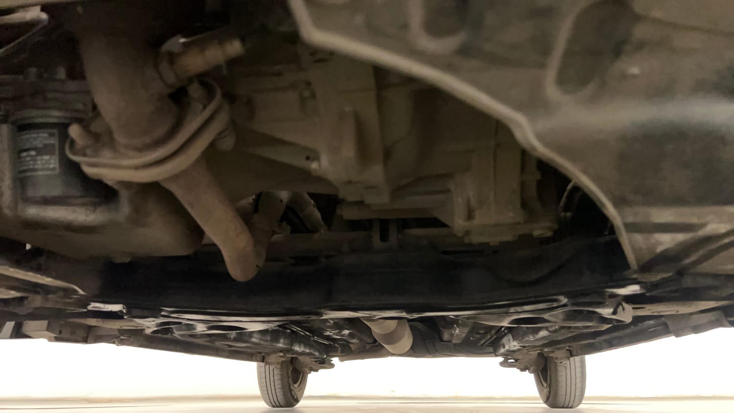 Used 2015 Maruti Suzuki Swift VXi Petrol Manual extra FRONT LEFT UNDERBODY VIEW