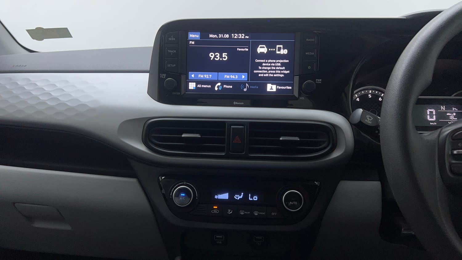 Used 2020 Hyundai Grand i10 Nios Sportz AMT 1.2 Kappa VTVT Petrol Automatic top_features Integrated (in-dash) music system