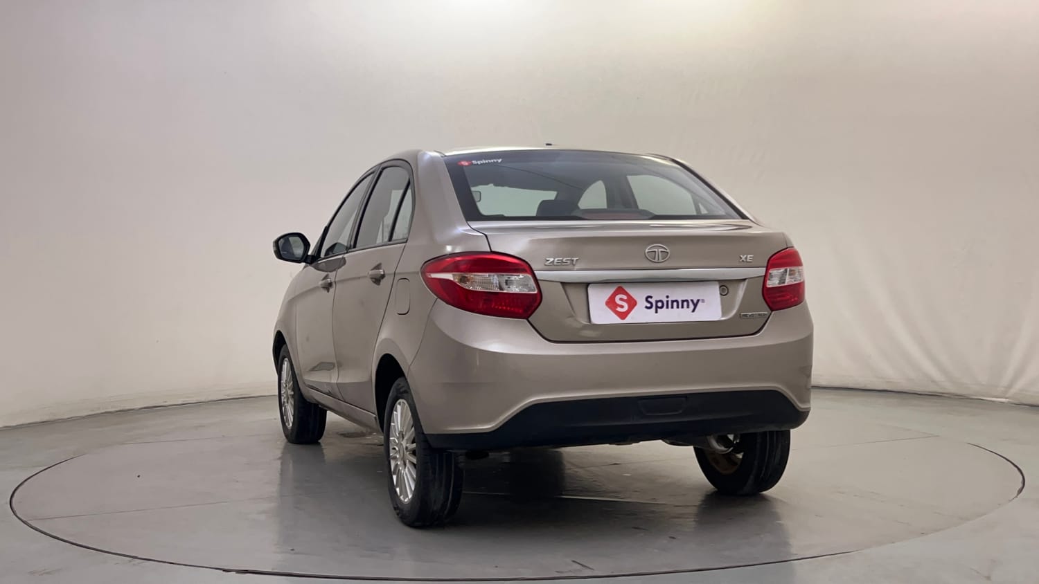 Used 2015 Tata Zest XE Petrol Petrol Manual exterior LEFT REAR CORNER VIEW