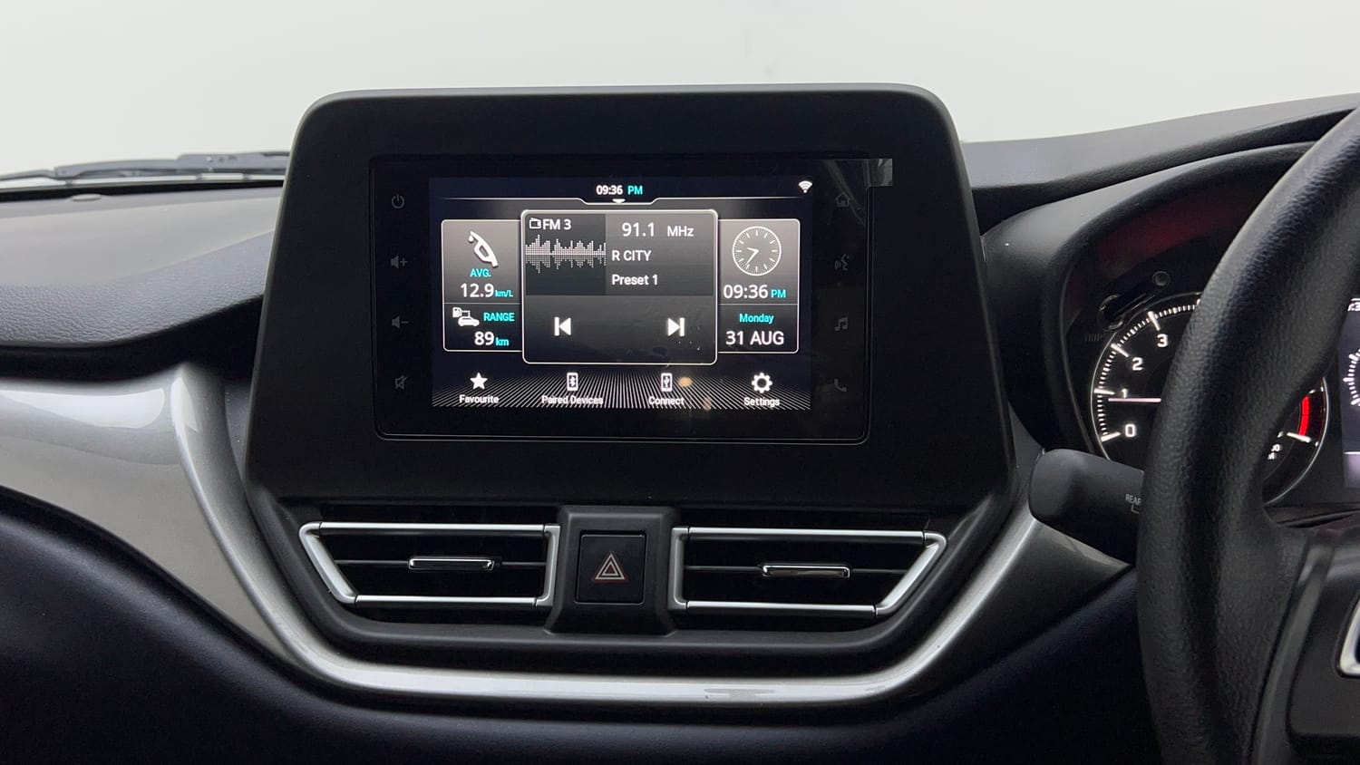 Used 2023 Maruti Suzuki Baleno Zeta MT Petrol Manual top_features Integrated (in-dash) music system